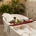 SereneLife Bamboo Bathtub Caddy in a cozy home spa bathroom with soft pastel tones