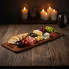 Bokon Wooden Charcuterie Board styled with artisan bread, meats, cheeses, grapes and red wine in warm candlelit setting